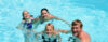 Family in swimming pool